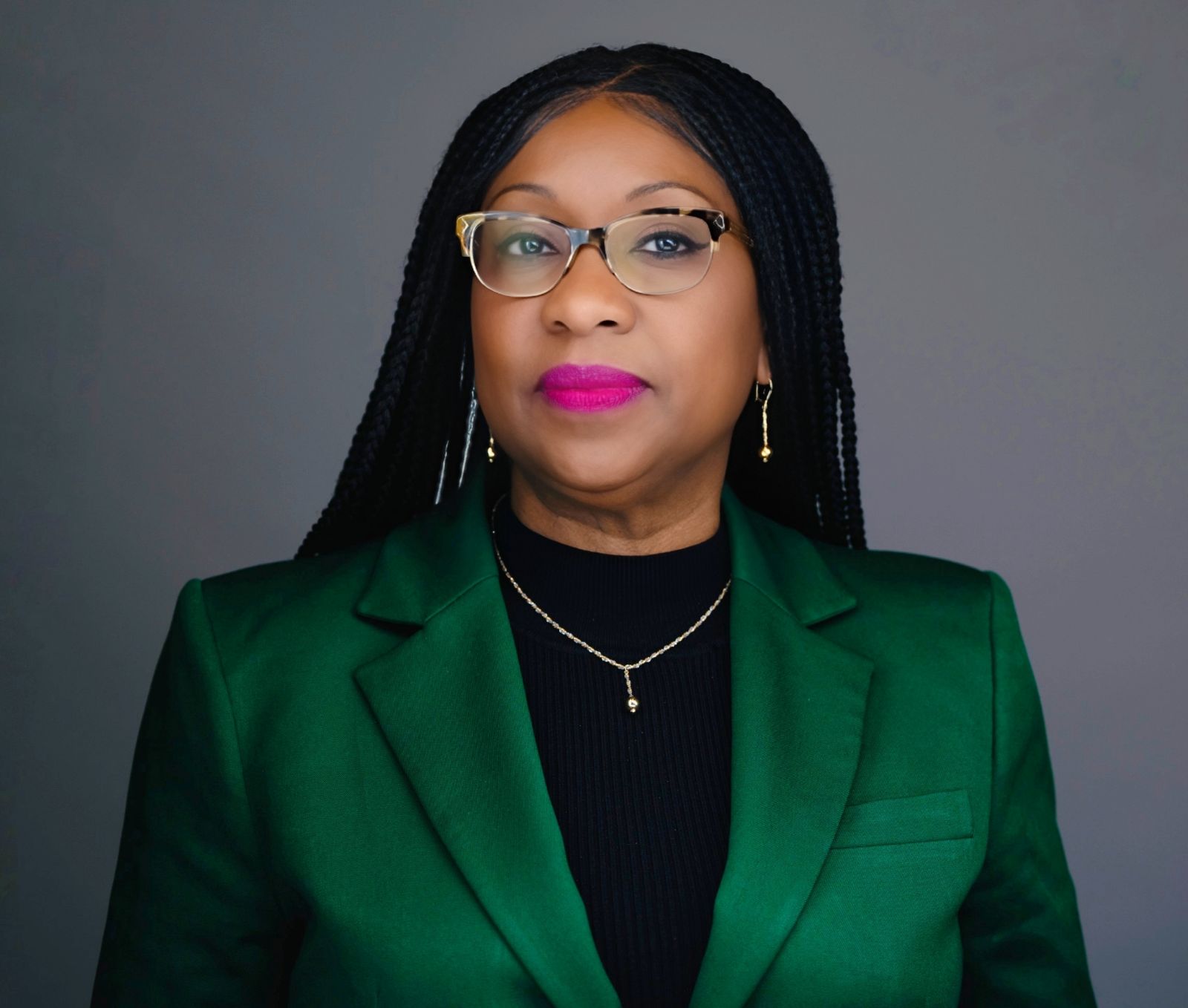 Dr. Jolander Headley Green Blazer with Glasses