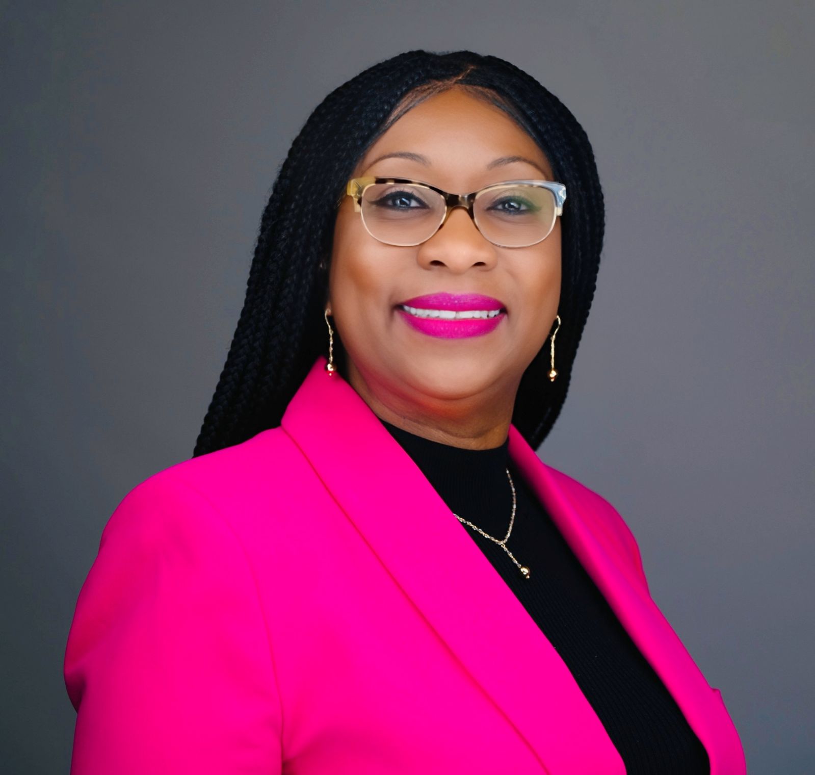 Dr. Jolander Headley Pink Blazer with Glasses